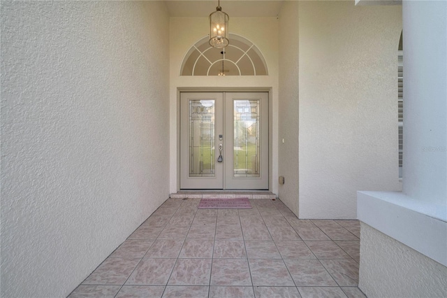 10955 Lemay Dr, Clermont, FL 34711 - property entrance featuring french doors and stucco siding