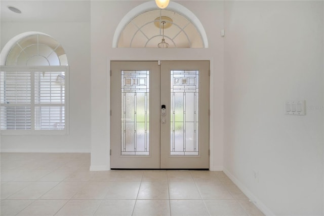 10955 Lemay Dr, Clermont, FL 34711 - tiled foyer entrance with french doors and plenty of natural light