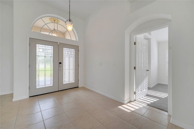 10955 Lemay Dr, Clermont, FL 34711 - entryway featuring french doors and light tile patterned floors