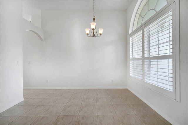 10955 Lemay Dr, Clermont, FL 34711 - unfurnished room with a chandelier and light tile patterned floors