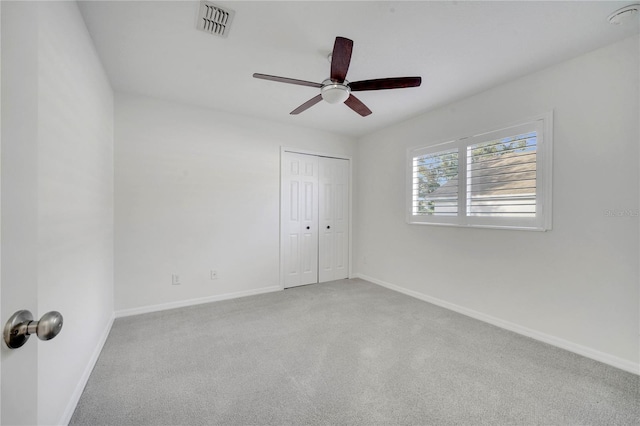 10955 Lemay Dr, Clermont, FL 34711 - unfurnished bedroom featuring carpet flooring, a closet, and ceiling fan