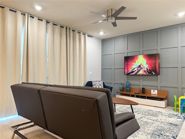 271 Jetty Way, Davenport, FL 33897 - tiled cinema room featuring a decorative wall, a ceiling fan, and recessed lighting