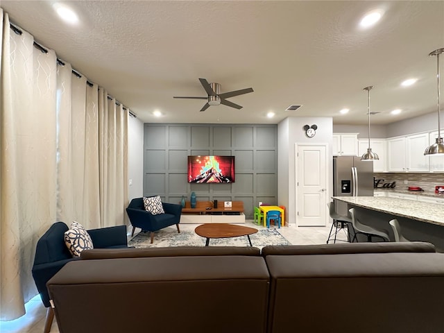 271 Jetty Way, Davenport, FL 33897 - living room with ceiling fan and recessed lighting