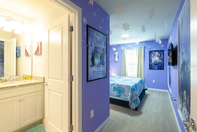 271 Jetty Way, Davenport, FL 33897 - bedroom with a sink, baseboards, and carpet floors