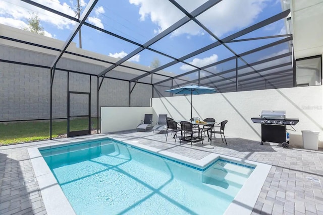 271 Jetty Way, Davenport, FL 33897 - outdoor pool featuring a patio, grilling area, and a lanai