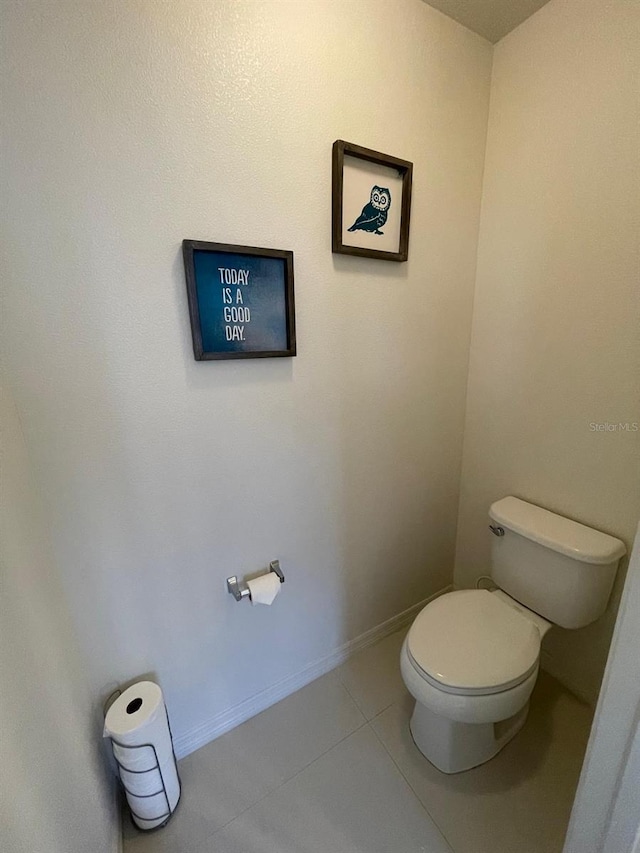 14753 Snowy Egret St, Winter Garden, FL 34787 - bathroom with tile patterned flooring, toilet, and baseboards