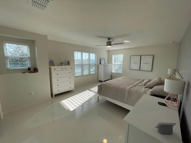 14753 Snowy Egret St, Winter Garden, FL 34787 - bedroom with baseboards and ceiling fan