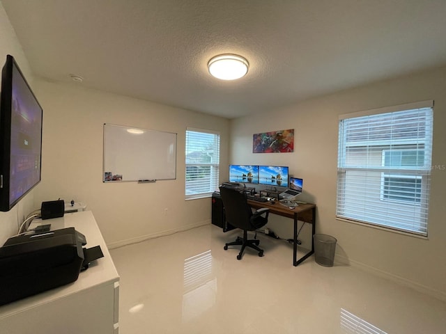 14753 Snowy Egret St, Winter Garden, FL 34787 - home office featuring baseboards and a textured ceiling