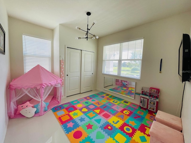 14753 Snowy Egret St, Winter Garden, FL 34787 - game room with a chandelier