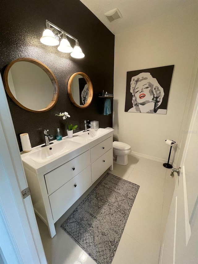 14753 Snowy Egret St, Winter Garden, FL 34787 - bathroom featuring double vanity, toilet, and tile patterned flooring
