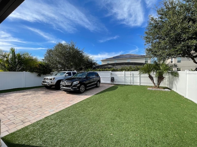 14753 Snowy Egret St, Winter Garden, FL 34787 - view of parking / parking lot featuring decorative driveway