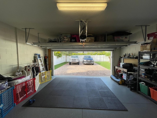 14753 Snowy Egret St, Winter Garden, FL 34787 - garage featuring concrete block wall