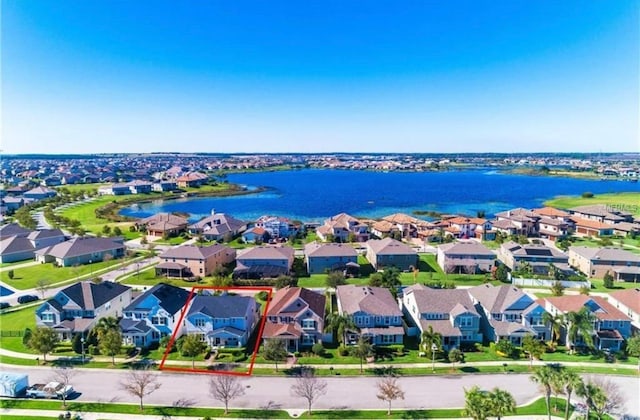 14753 Snowy Egret St, Winter Garden, FL 34787 - aerial perspective of suburban area featuring property parcel outlined and a nearby body of water