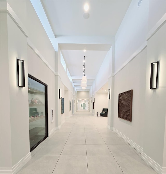 6129 Citrus Grove Ct, Saint Cloud, FL 34771 - corridor featuring light tile patterned floors and baseboards