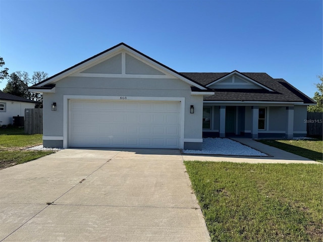 468 Marion Oaks Blvd, Ocala, FL 34473 - ranch-style house featuring driveway, an attached garage, a shingled roof, and stucco siding