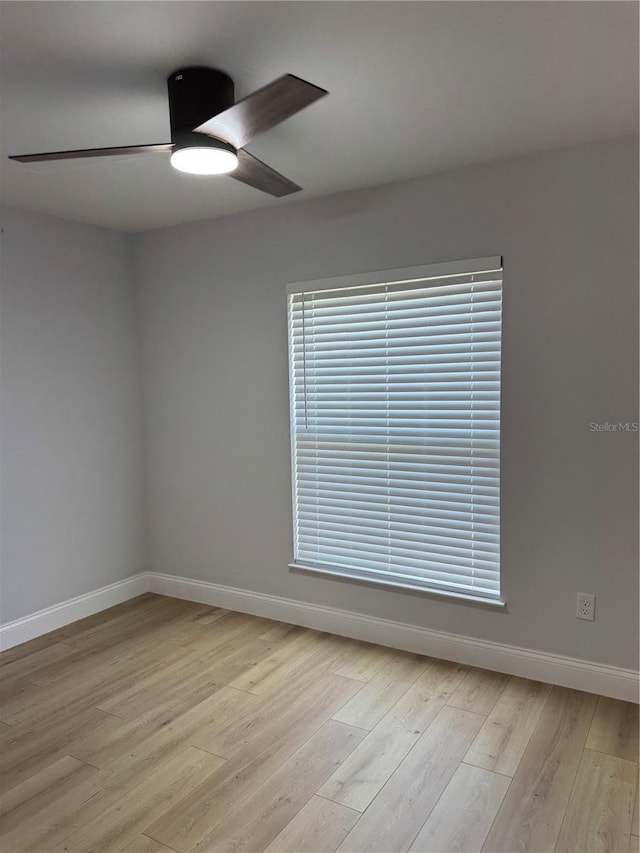 468 Marion Oaks Blvd, Ocala, FL 34473 - unfurnished room featuring a ceiling fan, light wood-style floors, and baseboards