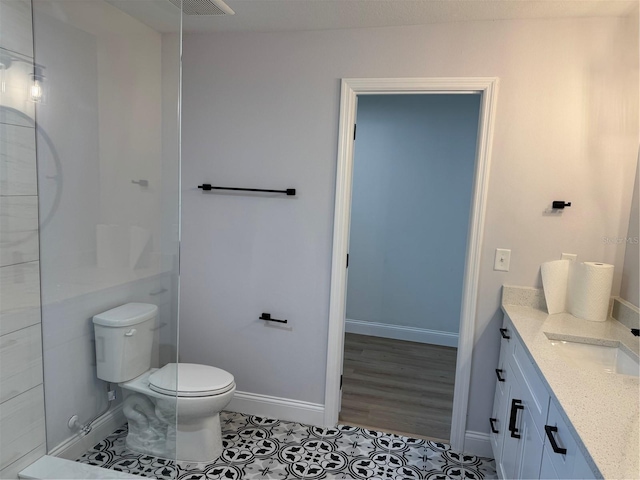 468 Marion Oaks Blvd, Ocala, FL 34473 - bathroom with toilet, vanity, baseboards, and tile patterned floors
