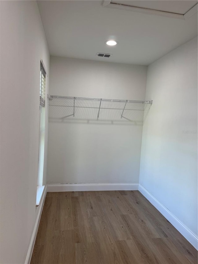 468 Marion Oaks Blvd, Ocala, FL 34473 - walk in closet with wood finished floors