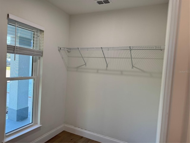 468 Marion Oaks Blvd, Ocala, FL 34473 - spacious closet featuring dark wood-type flooring