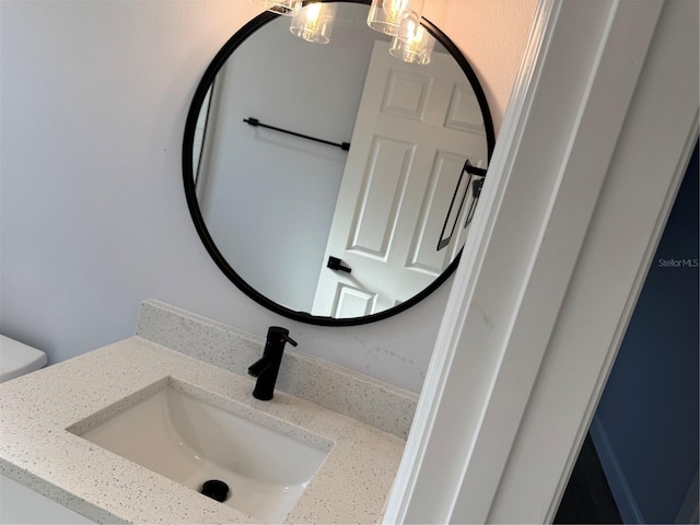 468 Marion Oaks Blvd, Ocala, FL 34473 - bathroom with vanity, toilet, and a chandelier
