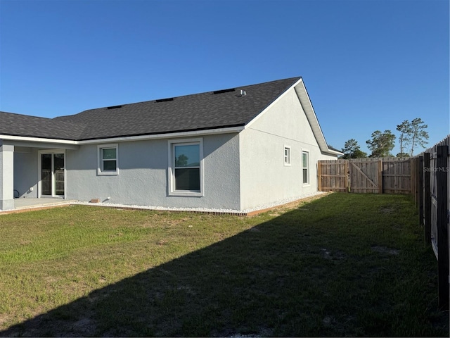 468 Marion Oaks Blvd, Ocala, FL 34473 - rear view of house with stucco siding and a shingled roof