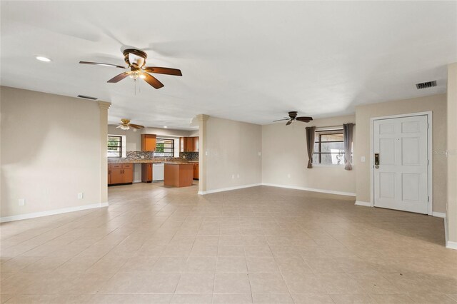 22 Hillcrest Dr, Babson Park, FL 33827 - unfurnished living room with a ceiling fan, baseboards, recessed lighting, and light tile patterned floors