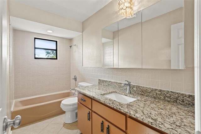 22 Hillcrest Dr, Babson Park, FL 33827 - bathroom with toilet, tasteful backsplash, vanity, tile patterned floors, and shower / washtub combination