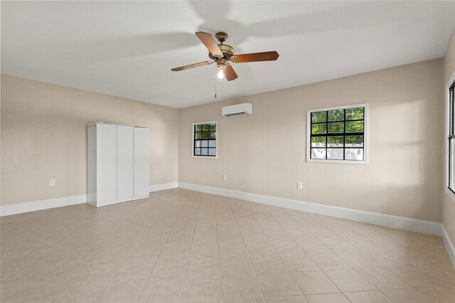 22 Hillcrest Dr, Babson Park, FL 33827 - empty room featuring a wall mounted air conditioner, plenty of natural light, ceiling fan, and baseboards