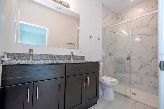 9825 N Swanee Ter, Dunnellon, FL 34433 - full bath with toilet, double vanity, a marble finish shower, and marble look tiles