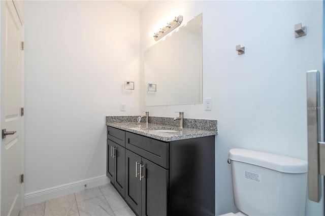 9825 N Swanee Ter, Dunnellon, FL 34433 - full bath featuring toilet, marble finish flooring, double vanity, and baseboards