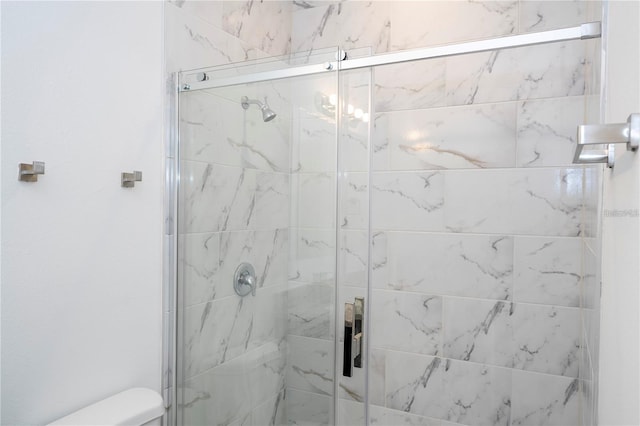 9825 N Swanee Ter, Dunnellon, FL 34433 - bathroom featuring a shower stall and toilet