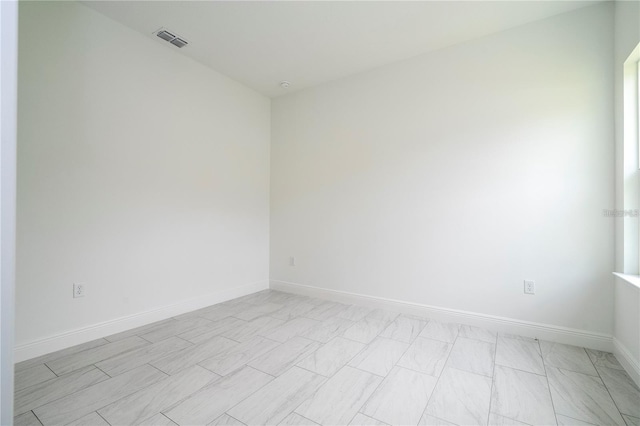 9825 N Swanee Ter, Dunnellon, FL 34433 - empty room featuring baseboards