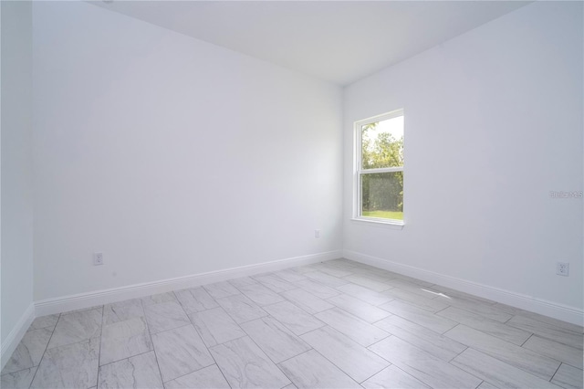 9825 N Swanee Ter, Dunnellon, FL 34433 - spare room featuring baseboards