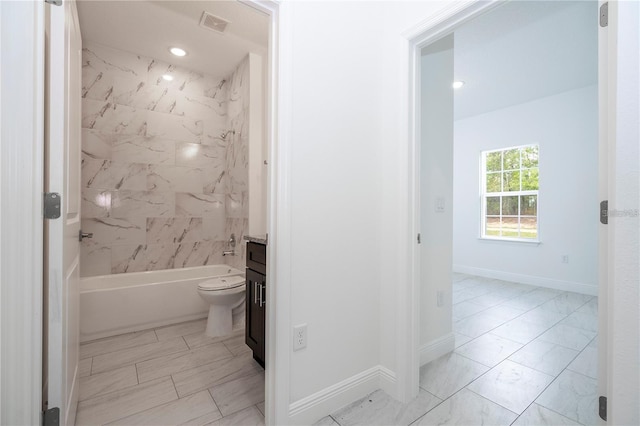 9825 N Swanee Ter, Dunnellon, FL 34433 - full bathroom featuring shower / bathtub combination, toilet, baseboards, and vanity