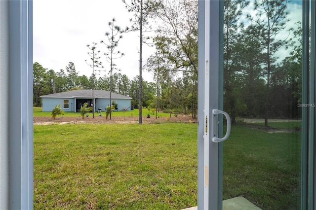 9825 N Swanee Ter, Dunnellon, FL 34433 - view of grassy yard