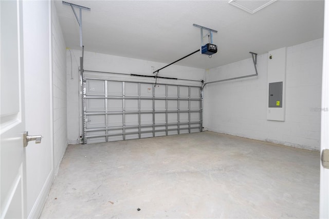 9825 N Swanee Ter, Dunnellon, FL 34433 - garage with electric panel, a garage door opener, and concrete block wall