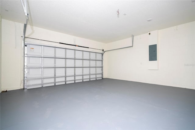 25 W 7th St, Apopka, FL 32703 - garage featuring electric panel and concrete block wall