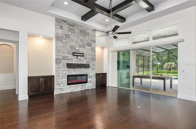 25859 Crossings Bluff Ln, Sorrento, FL 32776 - unfurnished living room with coffered ceiling, ceiling fan, hardwood / wood-style flooring, beam ceiling, and a fireplace