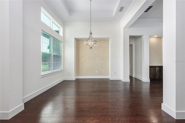 25859 Crossings Bluff Ln, Sorrento, FL 32776 - empty room with a chandelier, dark wood finished floors, baseboards, and a tray ceiling