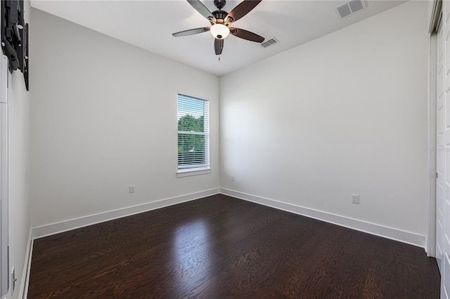 25859 Crossings Bluff Ln, Sorrento, FL 32776 - spare room featuring dark wood-type flooring, ceiling fan, and baseboards