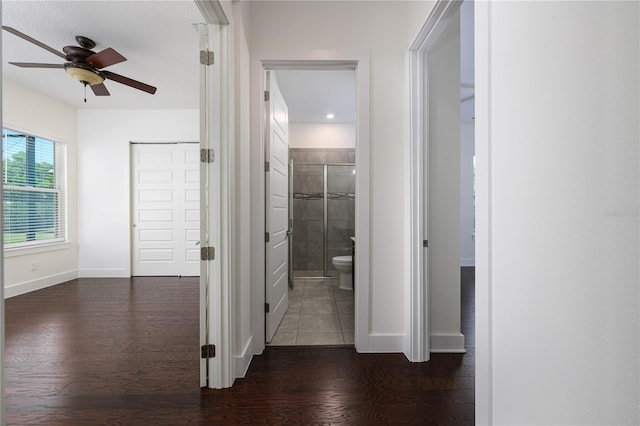 25859 Crossings Bluff Ln, Sorrento, FL 32776 - hallway featuring dark wood-style floors and baseboards