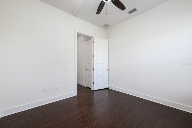 25859 Crossings Bluff Ln, Sorrento, FL 32776 - empty room featuring dark wood finished floors, a ceiling fan, baseboards, and a smoke detector