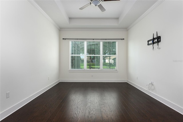 25859 Crossings Bluff Ln, Sorrento, FL 32776 - spare room with a raised ceiling, dark wood-style flooring, a ceiling fan, baseboards, and ornamental molding
