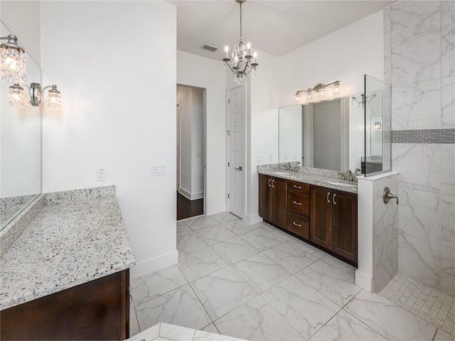 25859 Crossings Bluff Ln, Sorrento, FL 32776 - full bath featuring a chandelier, marble look tiles, double vanity, and a marble finish shower
