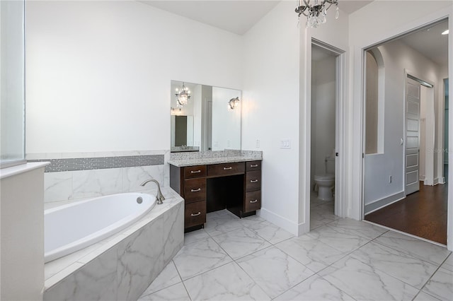 25859 Crossings Bluff Ln, Sorrento, FL 32776 - full bathroom with a chandelier, vanity, marble finish flooring, a garden tub, and toilet