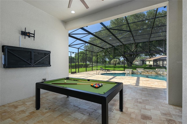 25859 Crossings Bluff Ln, Sorrento, FL 32776 - recreation room with a textured wall, ceiling fan, stone finish flooring, and recessed lighting
