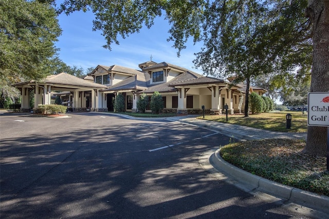 25859 Crossings Bluff Ln, Sorrento, FL 32776 - view of front of property featuring uncovered parking and stucco siding