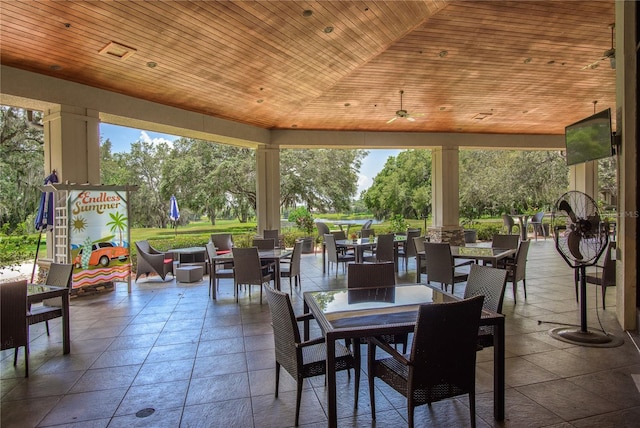 25859 Crossings Bluff Ln, Sorrento, FL 32776 - view of patio featuring outdoor dining area and ceiling fan