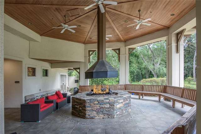 25859 Crossings Bluff Ln, Sorrento, FL 32776 - view of patio featuring a ceiling fan and an outdoor living space with a fire pit