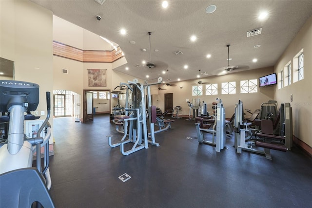 25859 Crossings Bluff Ln, Sorrento, FL 32776 - workout area with healthy amount of natural light, recessed lighting, a textured ceiling, baseboards, and a ceiling fan